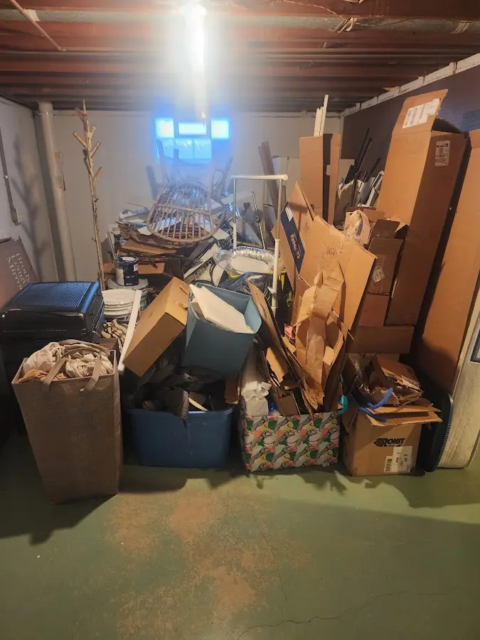 Roll-off dumpster container at job site for Cleanout Dumpster Rental in Covington